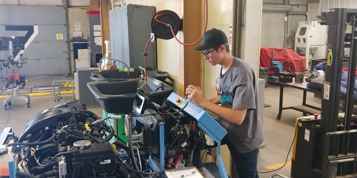 Blake running a diagnostic on the engine