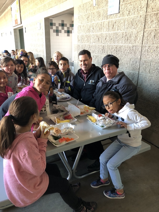 Dr. Landon enjoys his lunch with our 2nd graders!