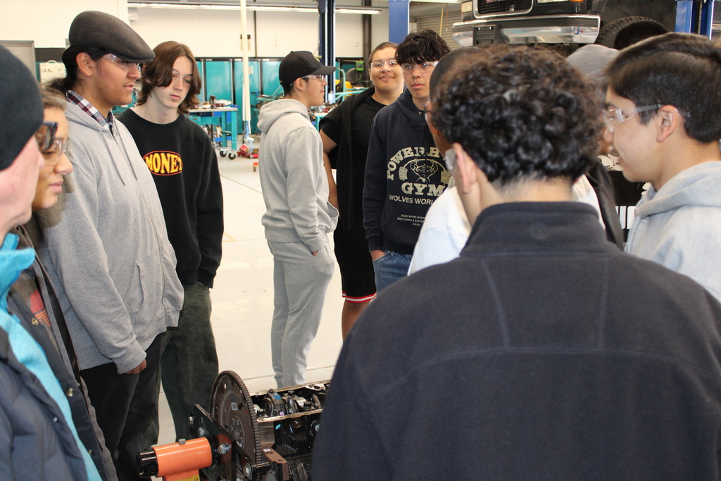 Students working on an engine