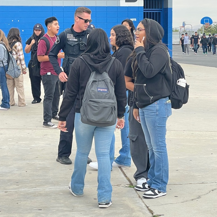 Officer Alexander with students  